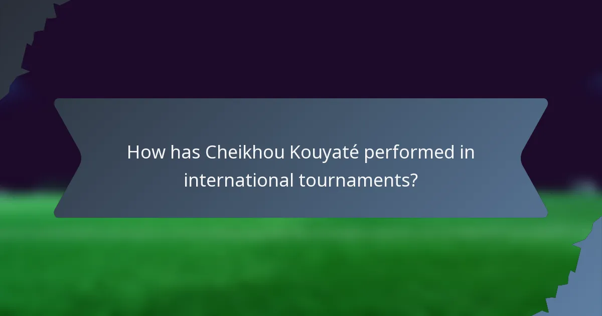 How has Cheikhou Kouyaté performed in international tournaments?